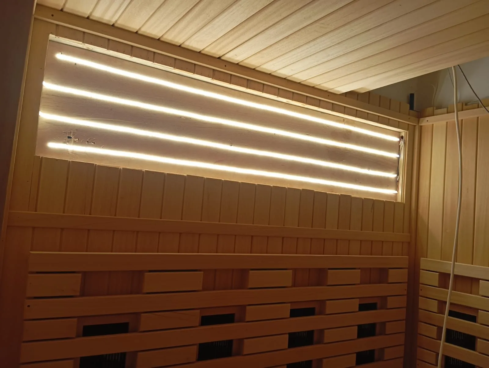 Concealed lighting and control detail inside a completed installation